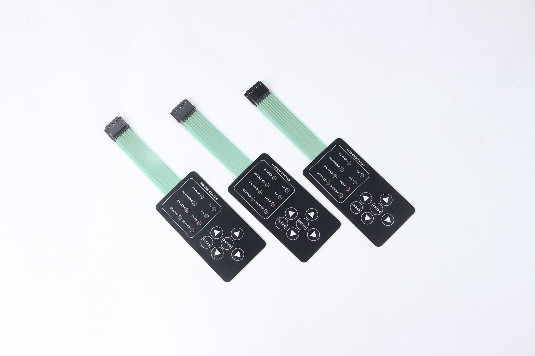 Three custom membrane switch control panels with flexible circuit tails and connectors