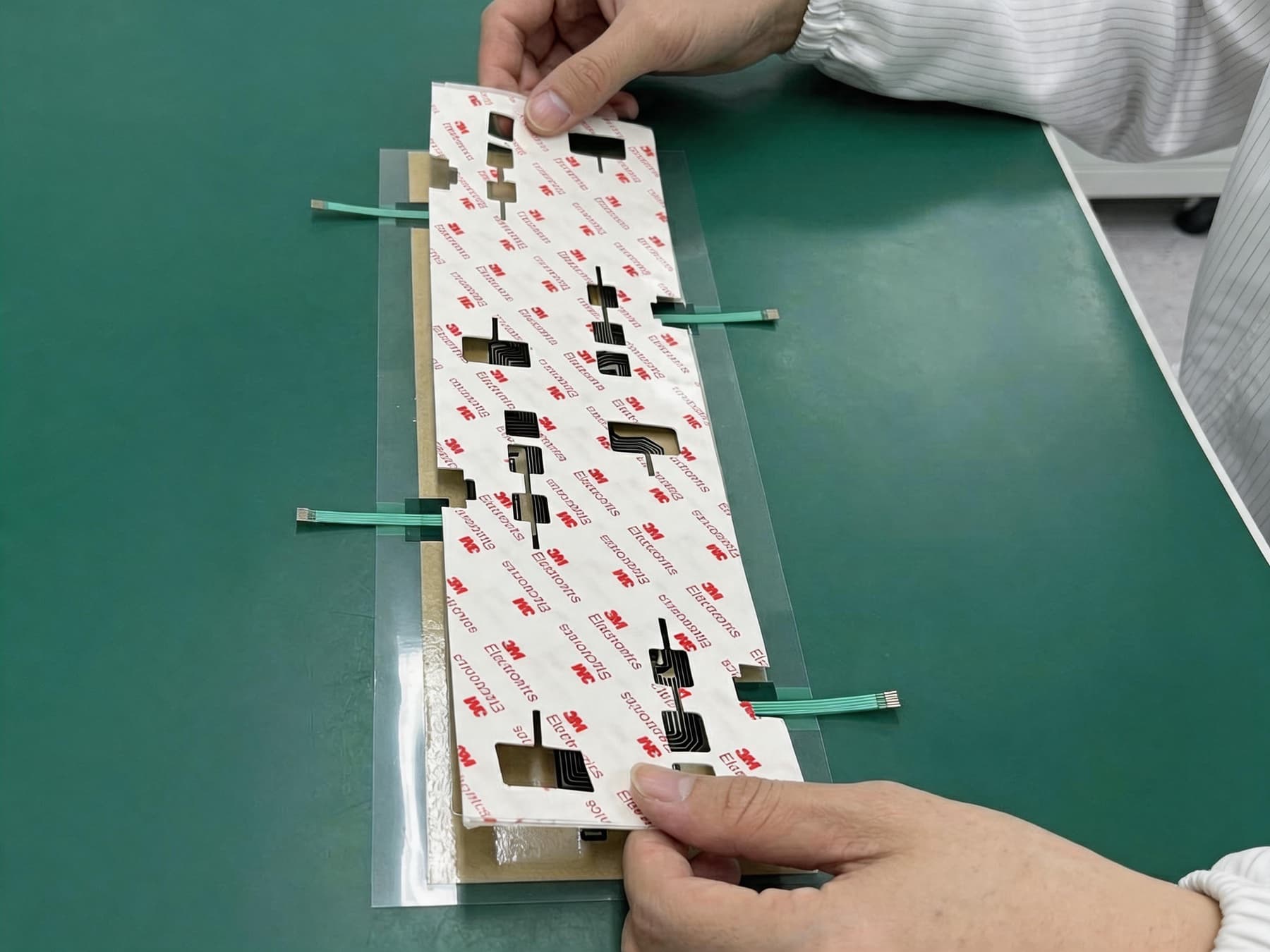 Assembly process for membrane switch layers